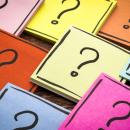 Question marks on post-it notes