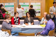 A group of people work together during a workshop