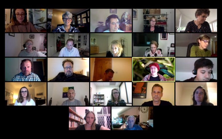 An image of a Zoom meeting screen with many faces of Governing Board and SMT members